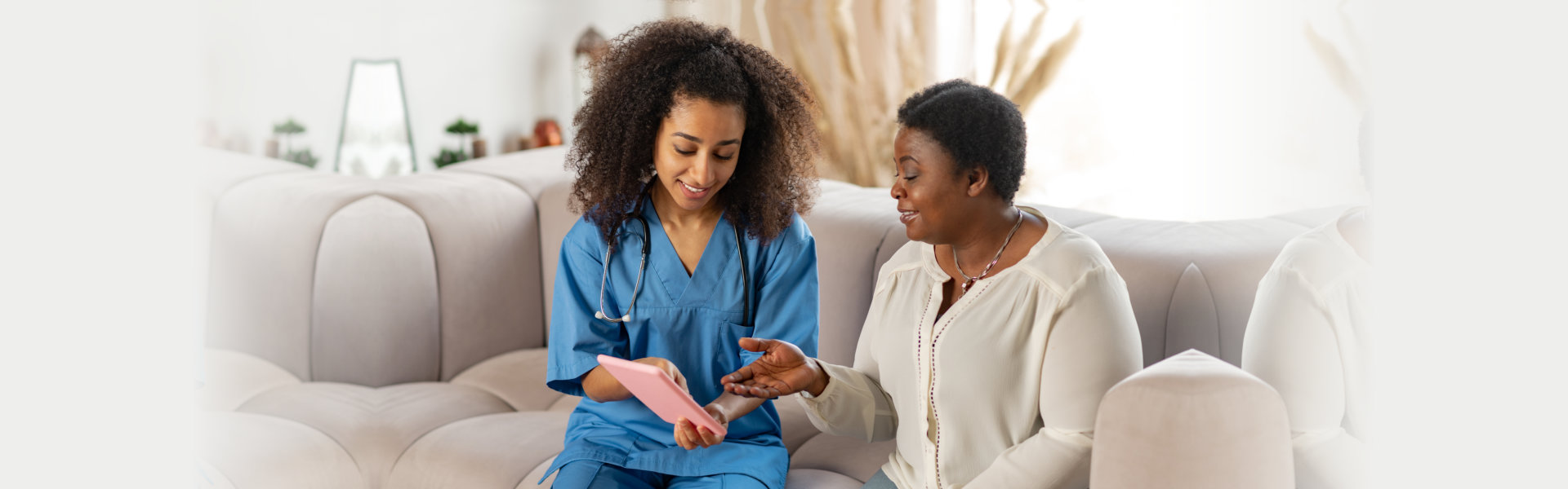 Caregiver taking care of an elderly woman